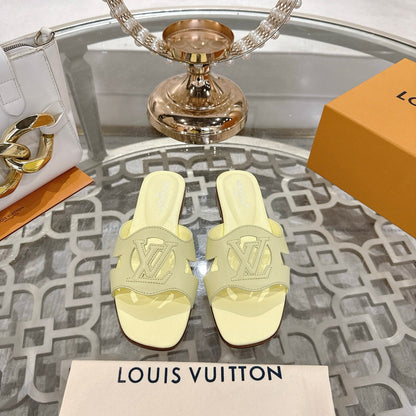 LOUIS VUITTON ISOLA FLAT SLIDE IN PALE YELLOW CALFSKIN