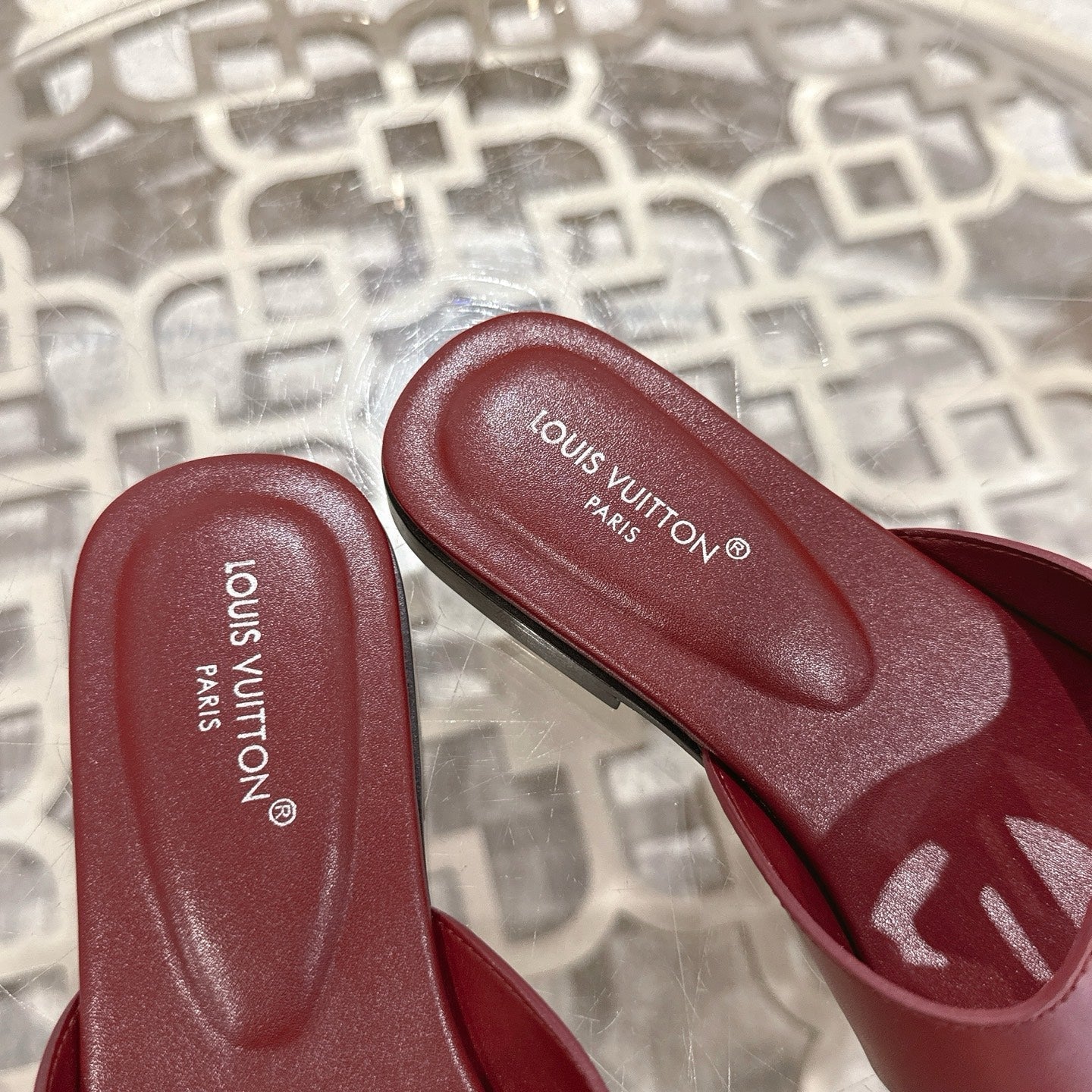 LOUIS VUITTON ISOLA FLAT SLIDE IN JAM RED CALFSKIN