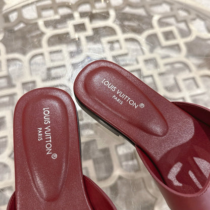 LOUIS VUITTON ISOLA FLAT SLIDE IN JAM RED CALFSKIN