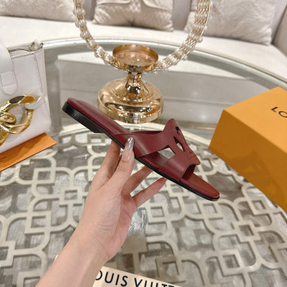 LOUIS VUITTON ISOLA FLAT SLIDE IN JAM RED CALFSKIN