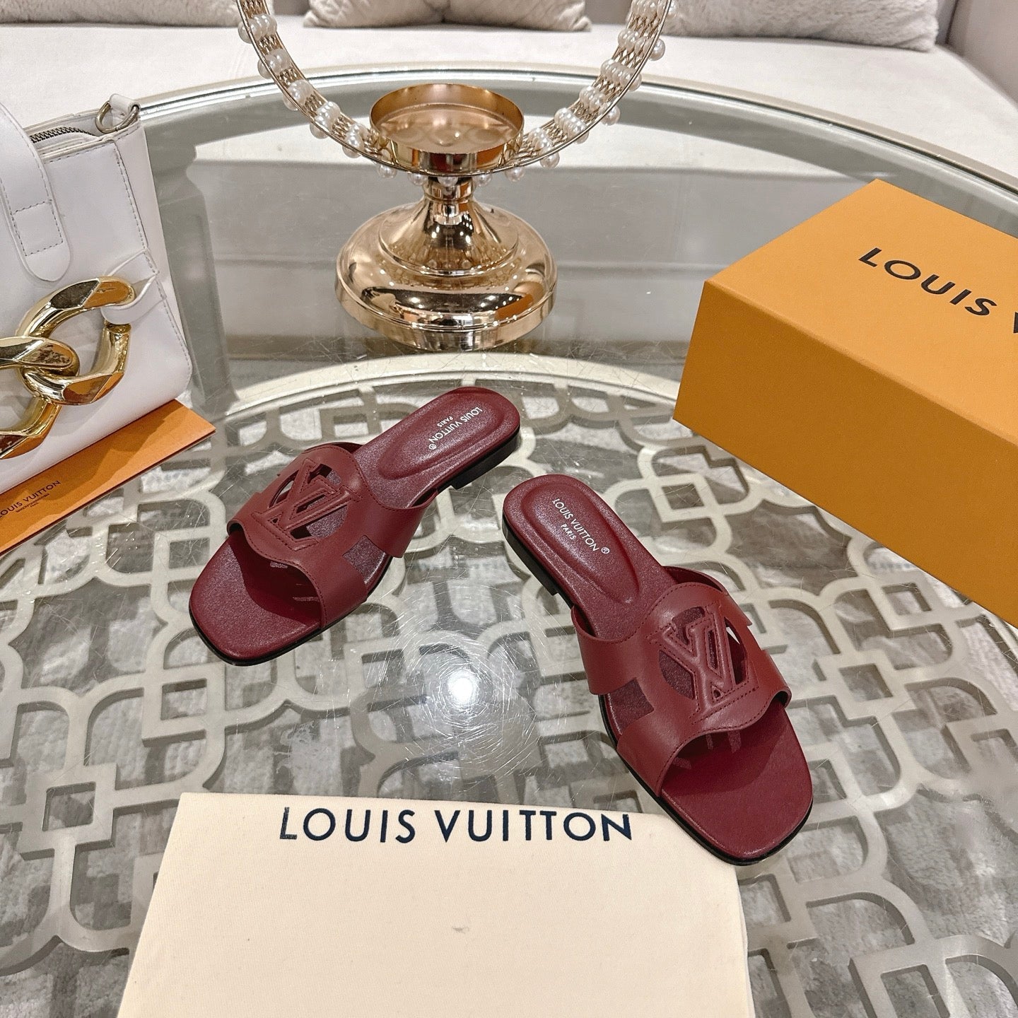 LOUIS VUITTON ISOLA FLAT SLIDE IN JAM RED CALFSKIN