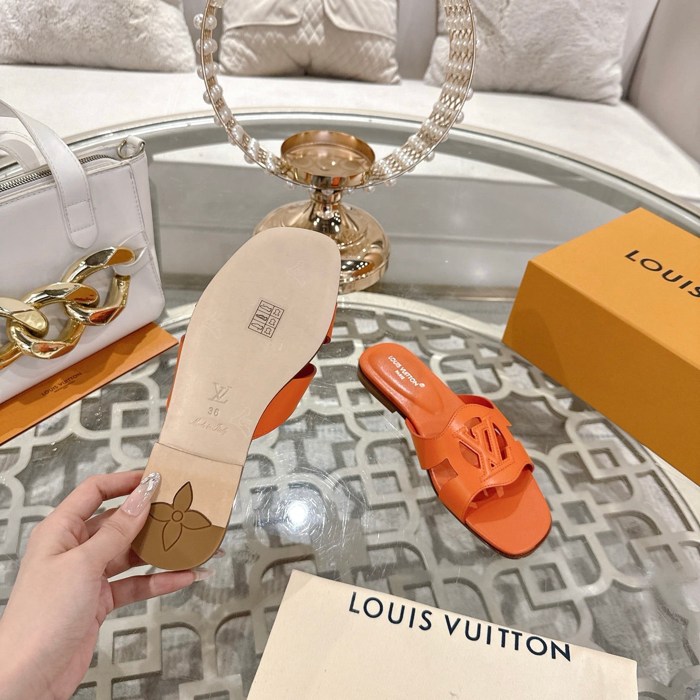LOUIS VUITTON ISOLA FLAT SLIDE IN VIVID ORANGE CALFSKIN