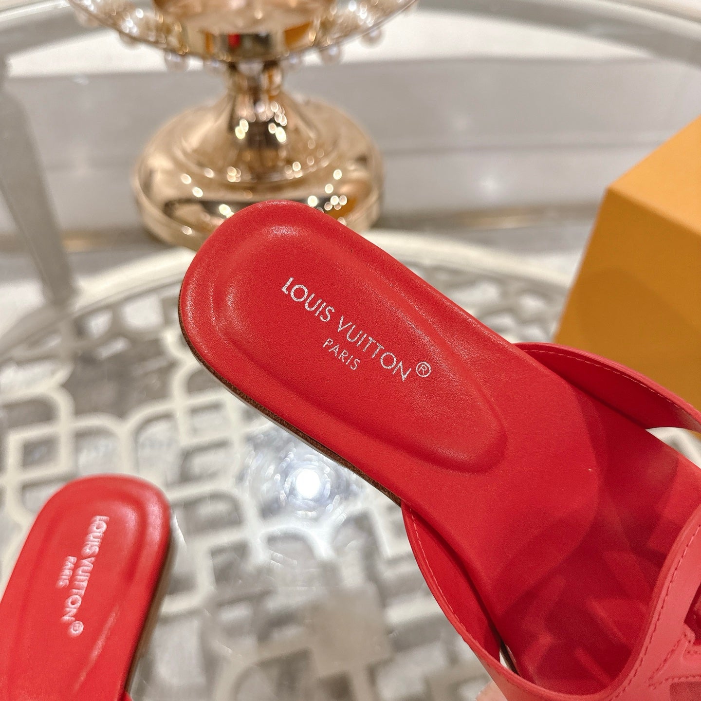 LOUIS VUITTON ISOLA FLAT SLIDE IN CHERRY RED CALFSKIN