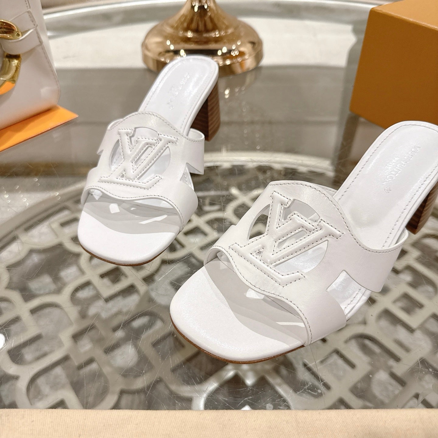 LOUIS VUITTON ISOLA HIGH 55 MM MULE IN WHITE CALFSKIN
