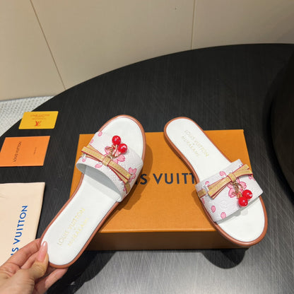 LOUIS VUITTON LV SLIDE SANDALS 25S IN WHITE CALFSKIN WITH CHERRY BLOSSOM BUCKLE