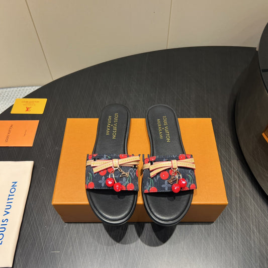 LOUIS VUITTON LV SLIDE SANDALS 25S IN BLACK DENIM AND CALFSKIN WITH CHERRY BLOSSOM BUCKLE