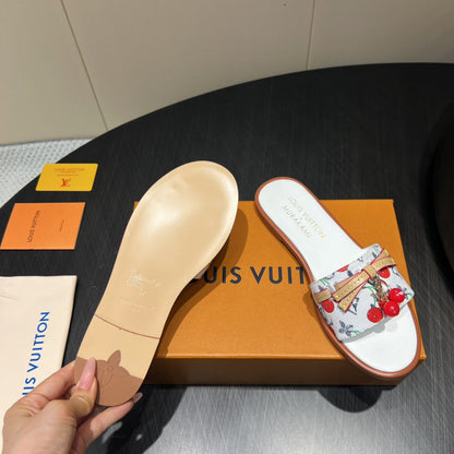 LOUIS VUITTON LV SLIDE SANDALS 25S IN WHITE DENIM AND CALFSKIN WITH CHERRY BLOSSOM BUCKLE