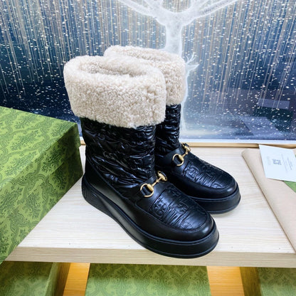 GUCCI HORSEBIT ANKLE BOOTS WITH MERINO TRIM IN BLACK EMBOSSED CALFSKIN