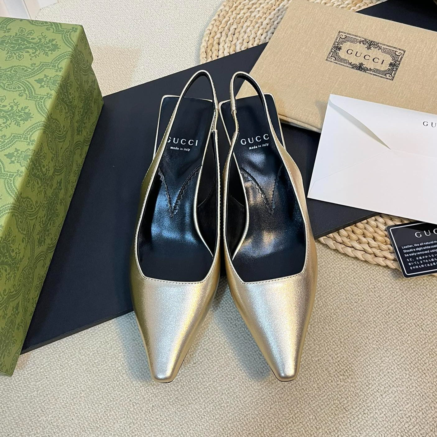 GUCCI Women's G plain leather logo Slingbacks Golden