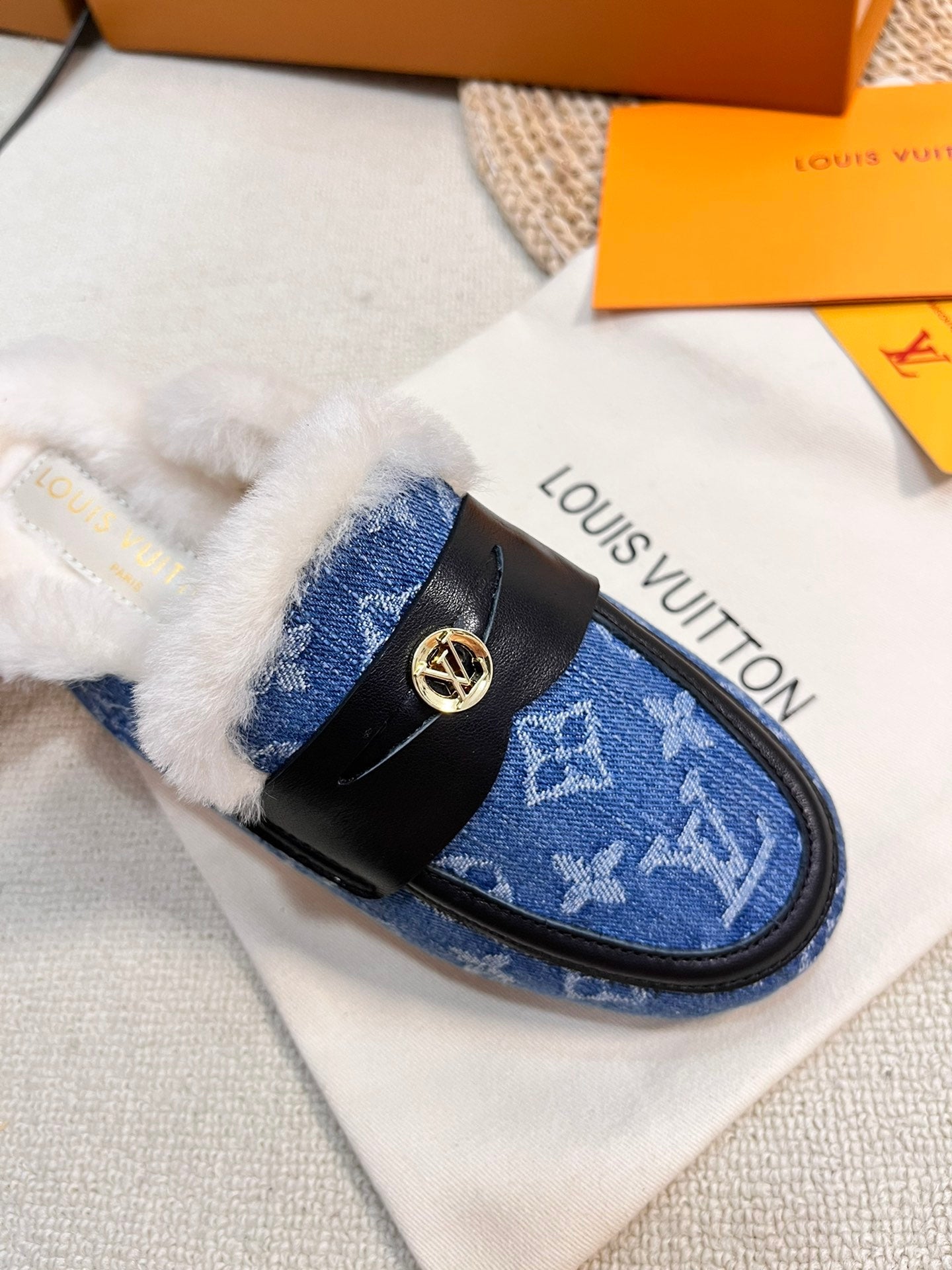 LOUIS VUITTON FLAT MULE IN COBALT BLUE MONOGRAM DENIM AND SHEARLING LINING