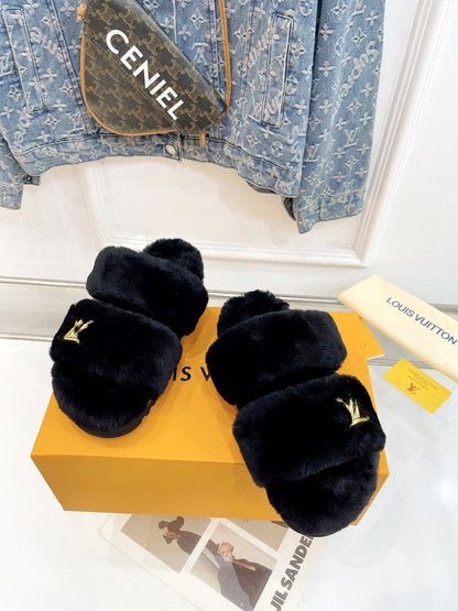 LOUIS VUITTON HALF MULE SLIPPERS IN BLACK FLEECE FEATURING METALLIC LOGO