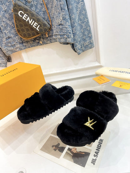 LOUIS VUITTON HALF MULE SLIPPERS IN BLACK FLEECE FEATURING METALLIC LOGO