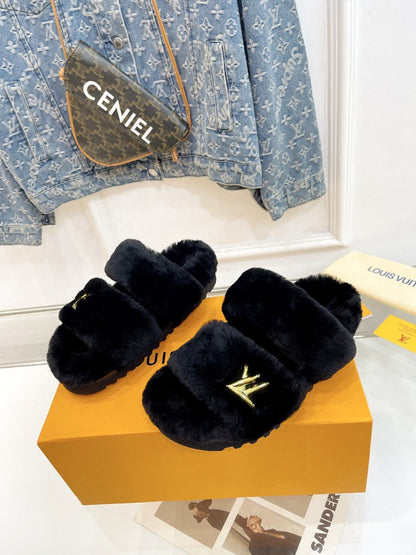 LOUIS VUITTON HALF MULE SLIPPERS IN BLACK FLEECE FEATURING METALLIC LOGO