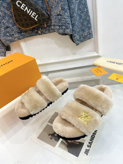 LOUIS VUITTON HALF MULE SLIPPERS IN CAMEL BEIGE FLEECE FEATURING METALLIC LOGO