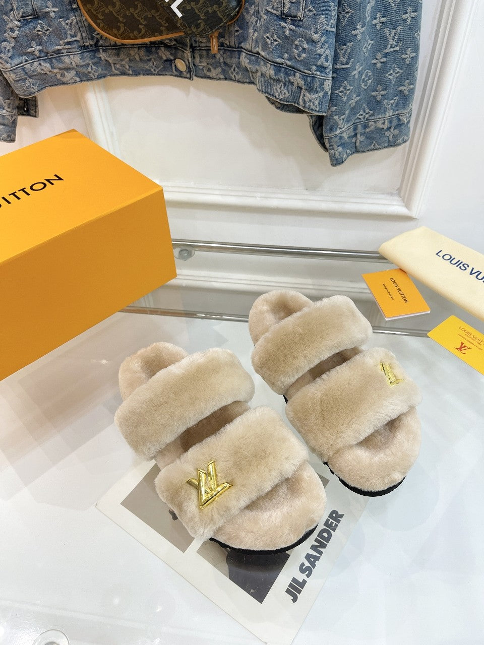 LOUIS VUITTON HALF MULE SLIPPERS IN CAMEL BEIGE FLEECE FEATURING METALLIC LOGO