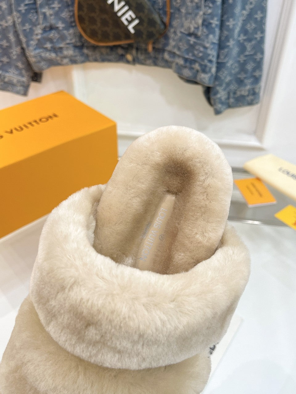 LOUIS VUITTON HALF MULE SLIPPERS IN CAMEL BEIGE FLEECE FEATURING METALLIC LOGO