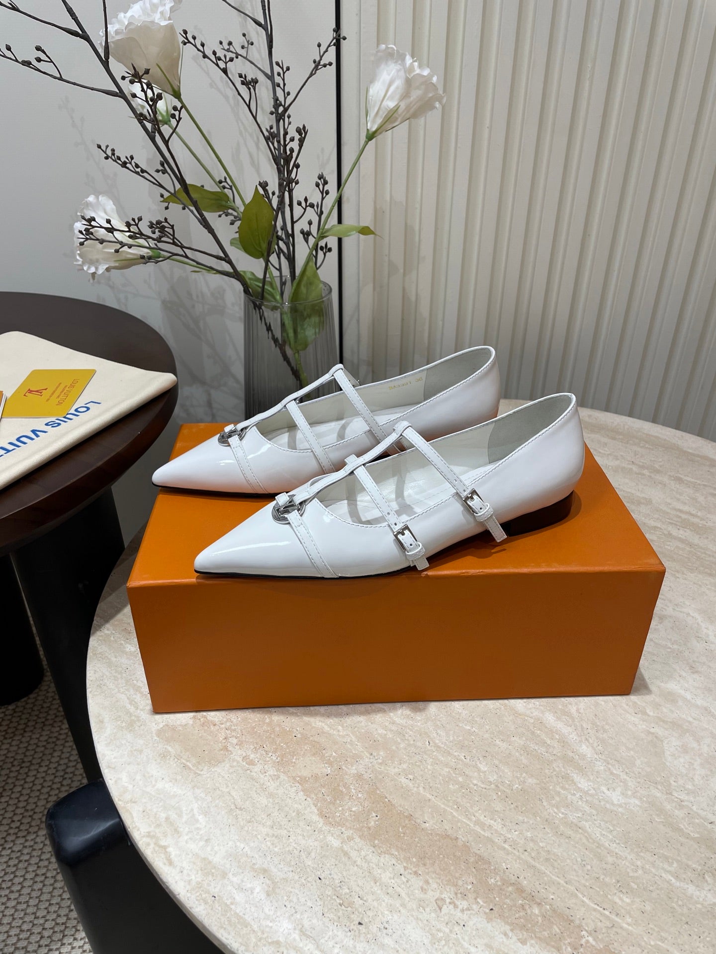 LOUIS VUITTON POINTED-TOE TRIPLE-STRAP BALLET FLAT IN WHITE PATENT CALFSKIN