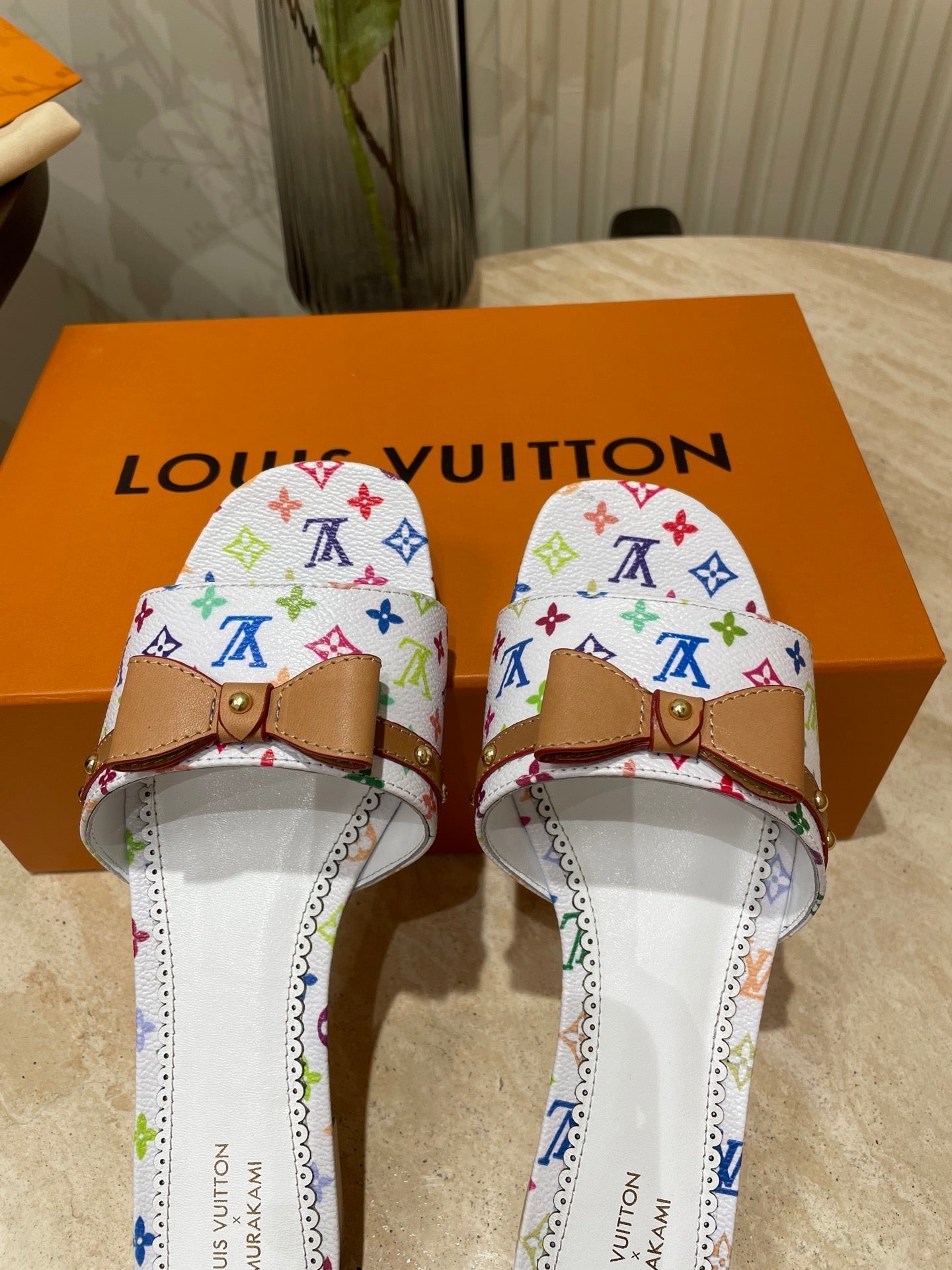 LOUIS VUITTON FLAT MULES IN WHITE MONOGRAM LAMBSKIN
