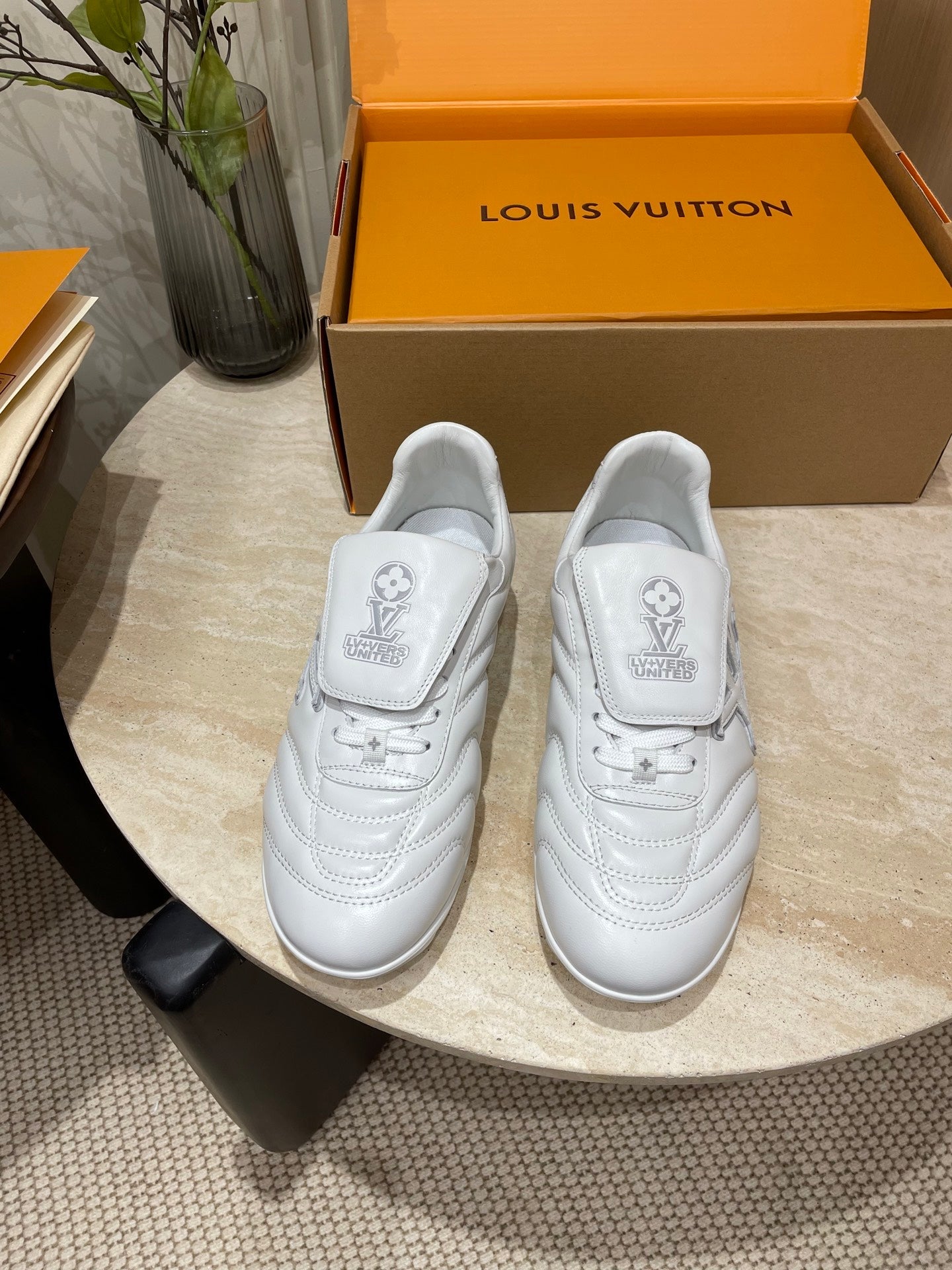 LOUIS VUITTON FOOTPRINT SOCCER SNEAKER IN WHITE CALFSKIN