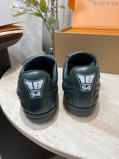 LOUIS VUITTON FOOTPRINT SOCCER SNEAKER IN FOREST GREEN CALFSKIN
