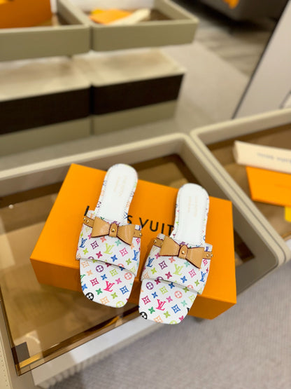 LOUIS VUITTON LV X TM 6AM FLAT MULE IN WHITE MONOGRAM CALFSKIN