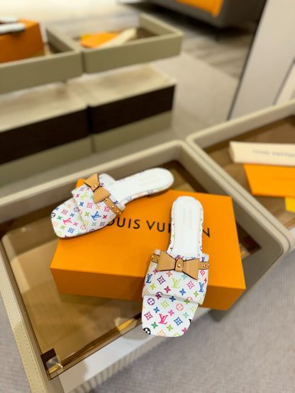 LOUIS VUITTON LV X TM 6AM FLAT MULE IN WHITE MONOGRAM CALFSKIN