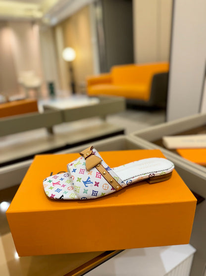 LOUIS VUITTON LV X TM 6AM FLAT MULE IN WHITE MONOGRAM CALFSKIN