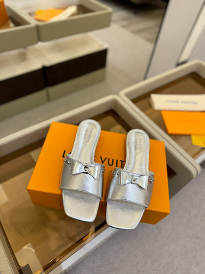 LOUIS VUITTON LV X TM 6AM FLAT MULE IN SILVER CALFSKIN