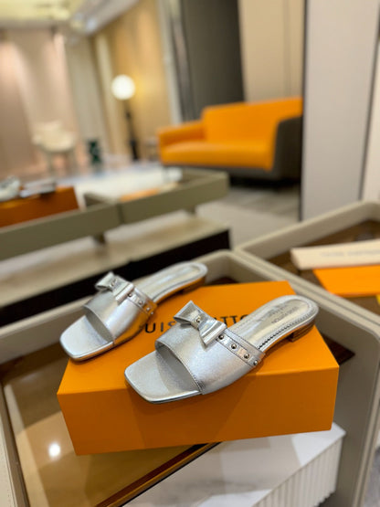 LOUIS VUITTON LV X TM 6AM FLAT MULE IN SILVER CALFSKIN