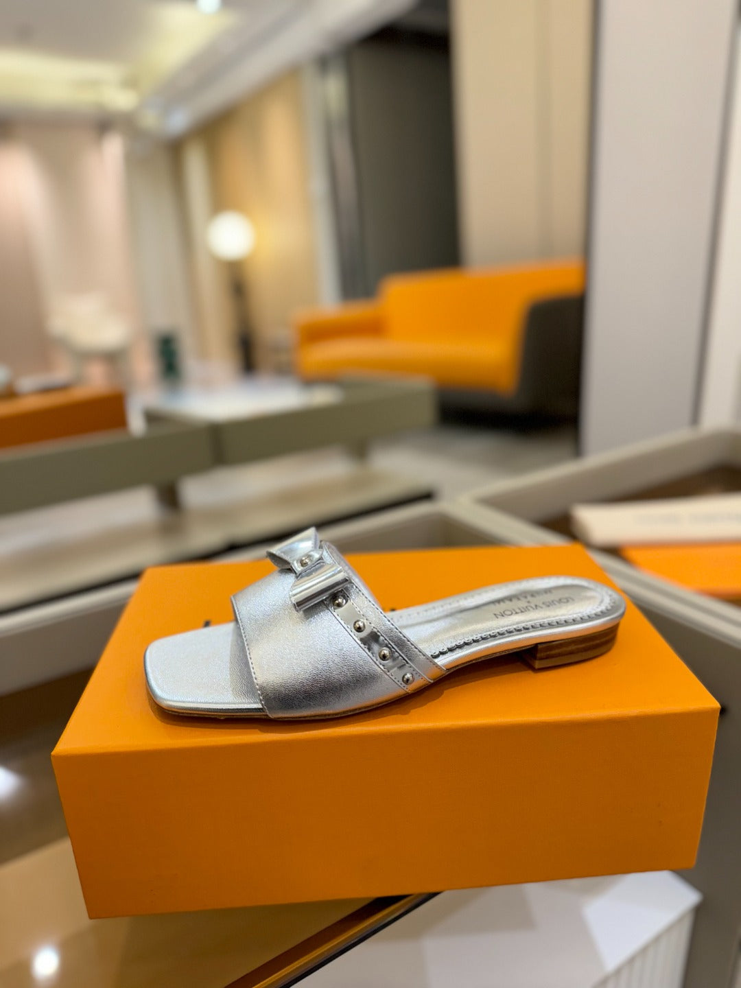 LOUIS VUITTON LV X TM 6AM FLAT MULE IN SILVER CALFSKIN