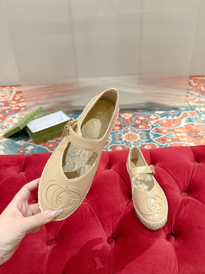 GUCCI CROSS STRAP FLAT SHOES IN BEIGE CALFSKIN WITH STRAW SOLE