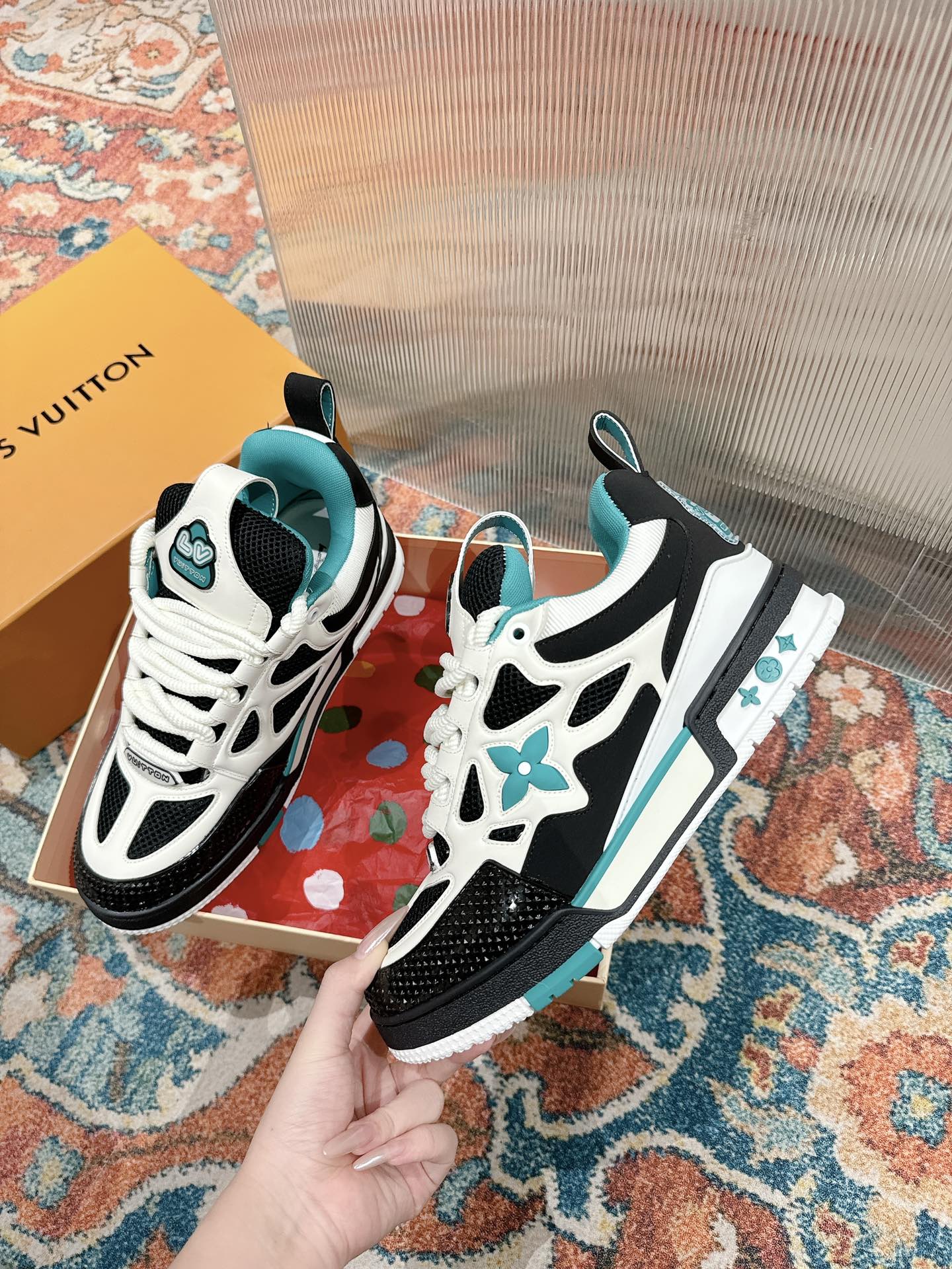LOUIS VUITTON LV SKATE SNEAKER IN WHITE MIX BLACK AND PERSIAN GREEN CALFSKIN