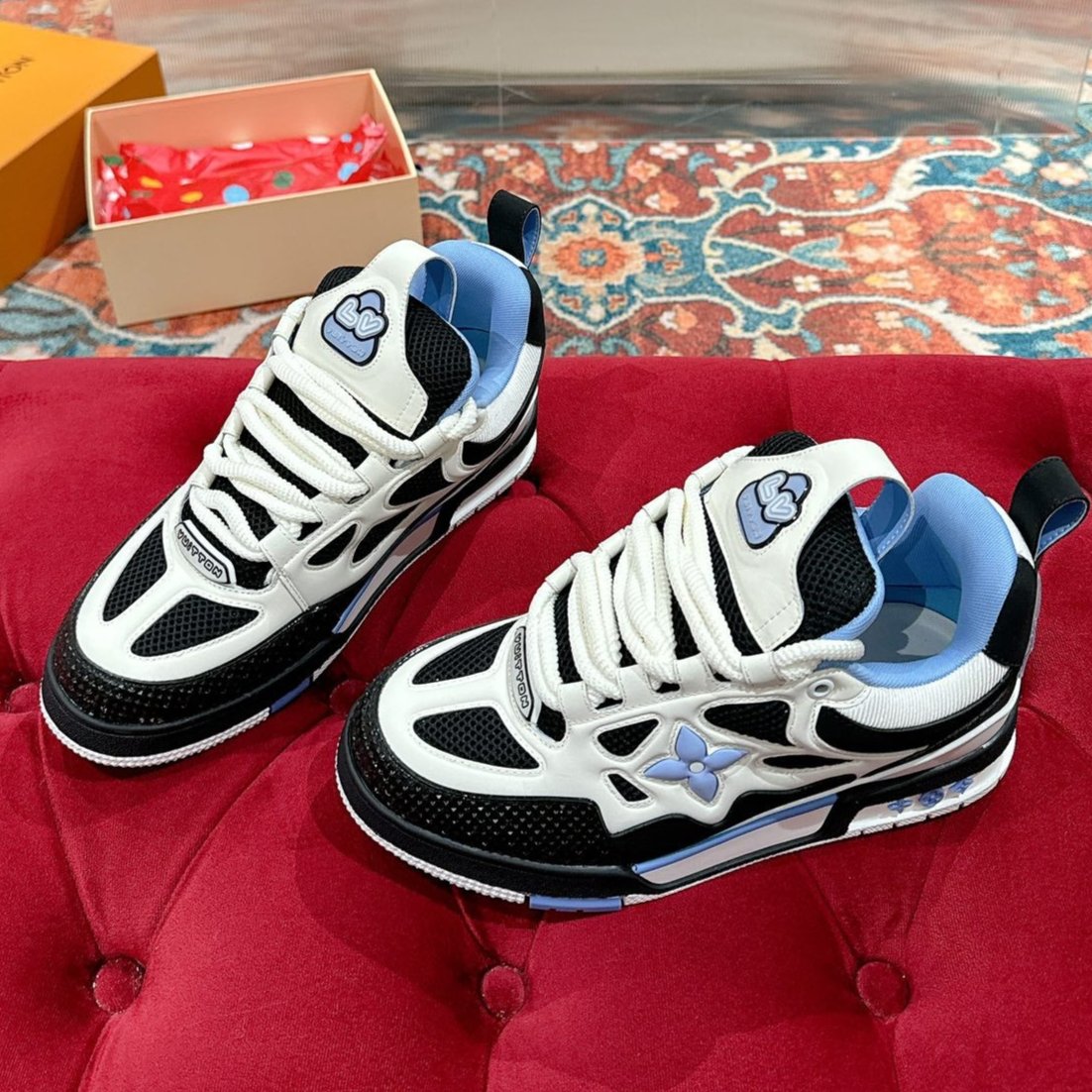 LOUIS VUITTON LV SKATE SNEAKER IN WHITE MIX BLACK AND SKY BLUE CALFSKIN