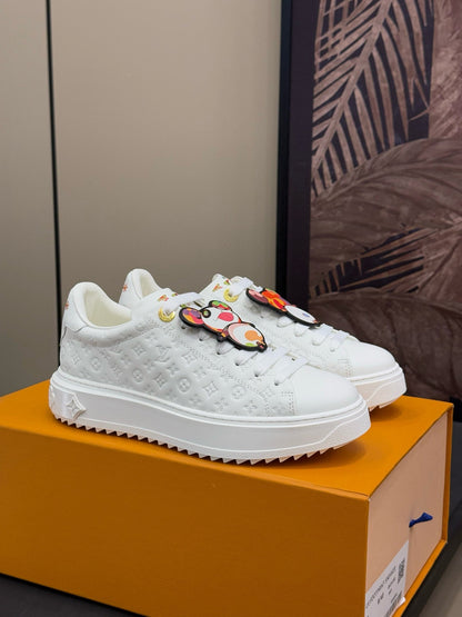 LOUIS VUITTON TIME OUT SNEAKER IN WHITE EMBOSSED MONOGRAM CALFSKIN
