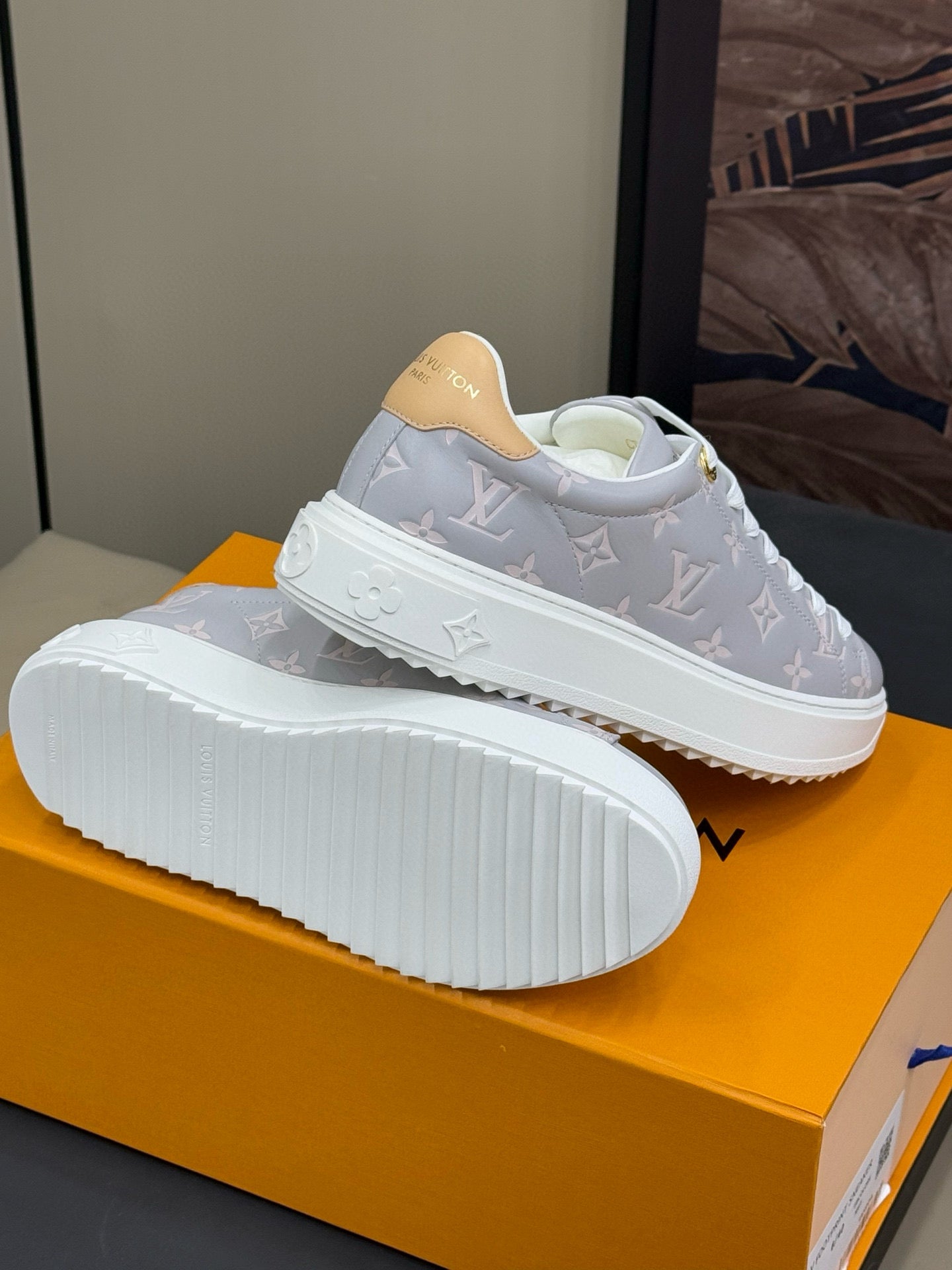 LOUIS VUITTON TIME OUT SNEAKER IN COOL GRAY EMBOSSED MONOGRAM CALFSKIN
