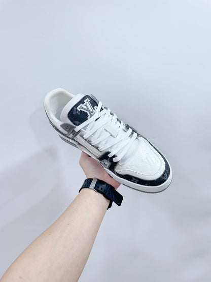 LOUIS VUITTON LV TRAINER SNEAKER IN WHITE CALFSKIN AND BLACK MONOGRAM DENIM