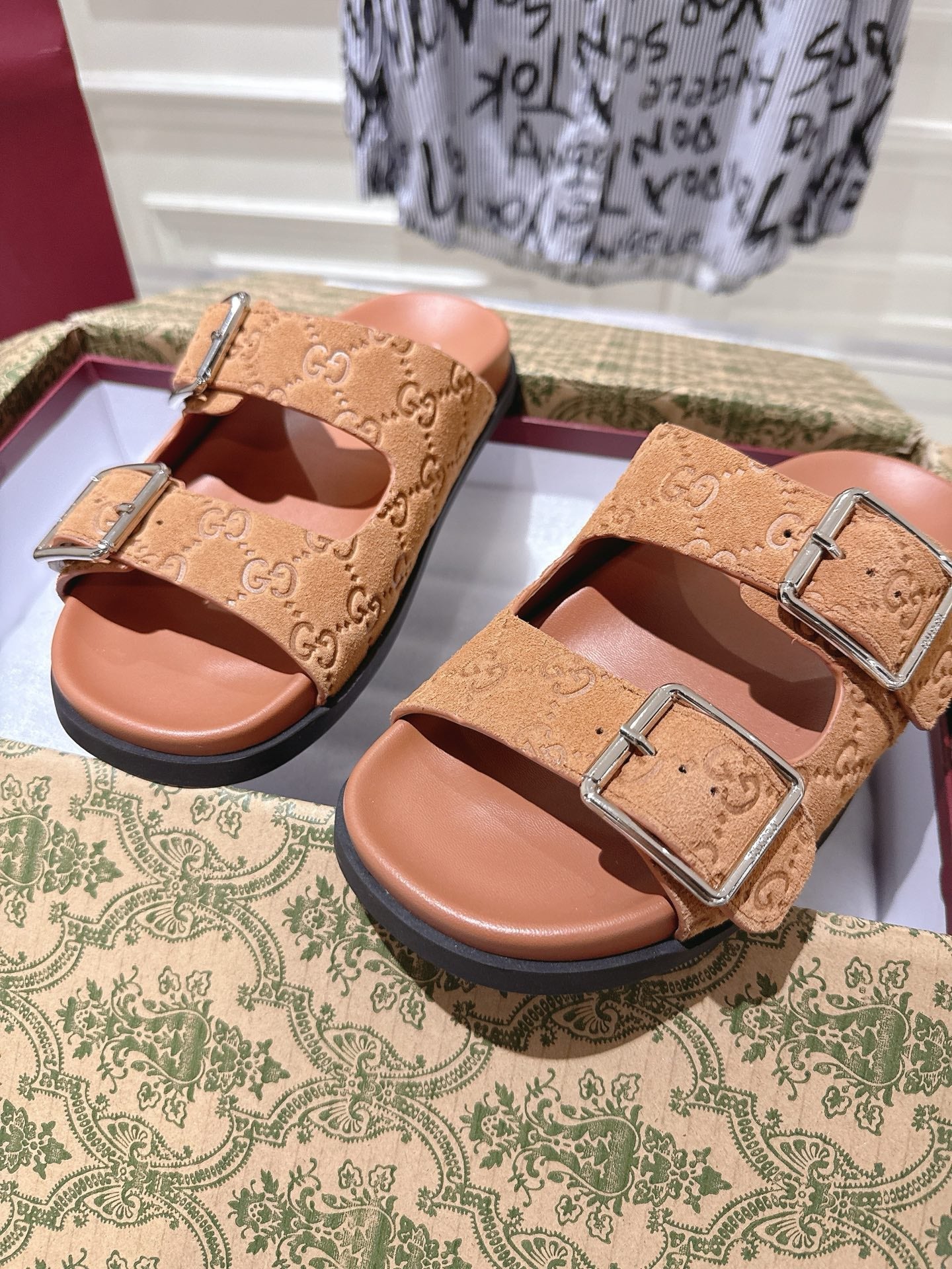 GUCCI SANDALS IN BURNT ORANGE SUEDE EMBOSSED LOGO SILVER HARDWARE