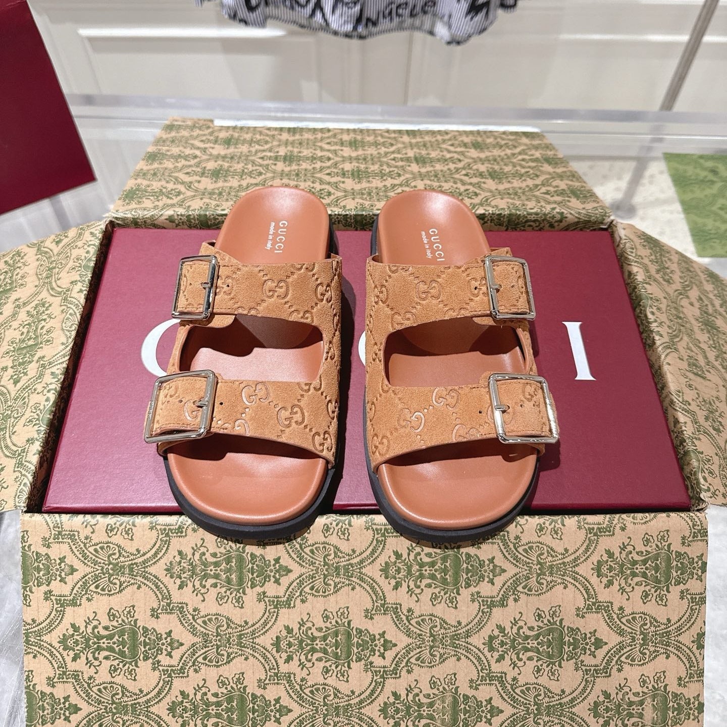 GUCCI SANDALS IN BURNT ORANGE SUEDE EMBOSSED LOGO SILVER HARDWARE