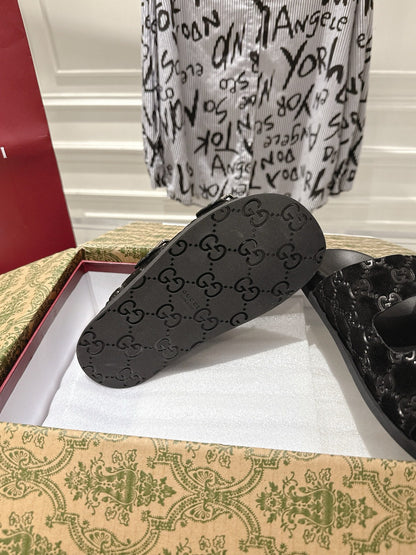 GUCCI SANDALS IN BLACK SUEDE EMBOSSED LOGO SILVER HARDWARE