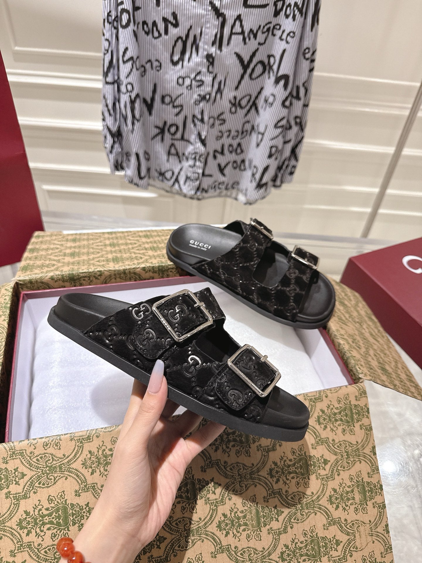 GUCCI SANDALS IN BLACK SUEDE EMBOSSED LOGO SILVER HARDWARE