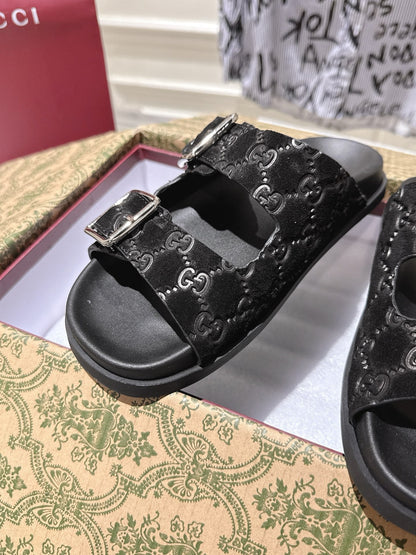 GUCCI SANDALS IN BLACK SUEDE EMBOSSED LOGO SILVER HARDWARE