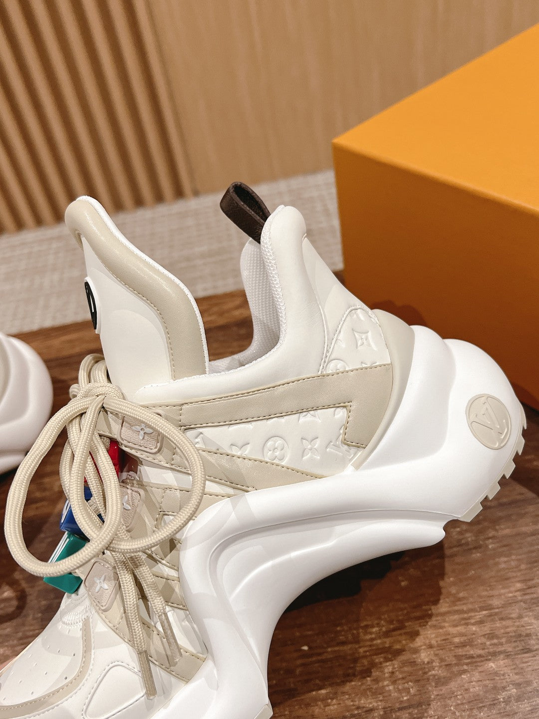 LOUIS VUITTON LV ARCHLIGHT SNEAKER IN BLANC BEIGE EMBOSSED CALFSKIN
