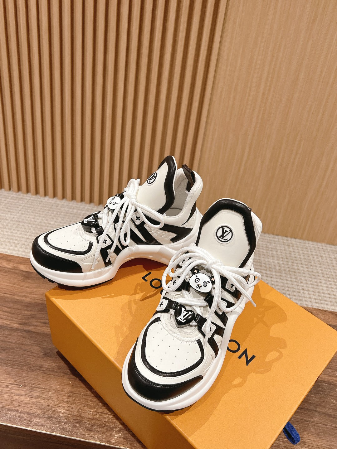 LOUIS VUITTON LV ARCHLIGHT SNEAKER IN WHITE MIX BLACK EMBOSSED CALFSKIN 101058