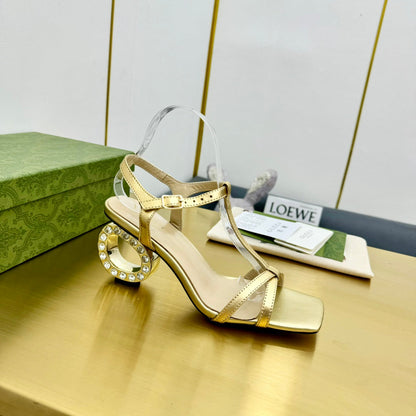 GUCCI MEDIUM-HEEL SANDAL IN GOLD CALFSKIN GOLD HARDWARE WITH RHINSTONES