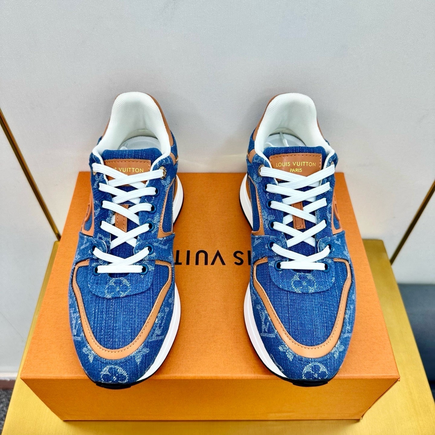 LOUIS VUITTON NEO RUN AWAY SNEAKER IN CLASSIC BLUE MONOGRAM DENIM AND ORANGE CALFSKIN