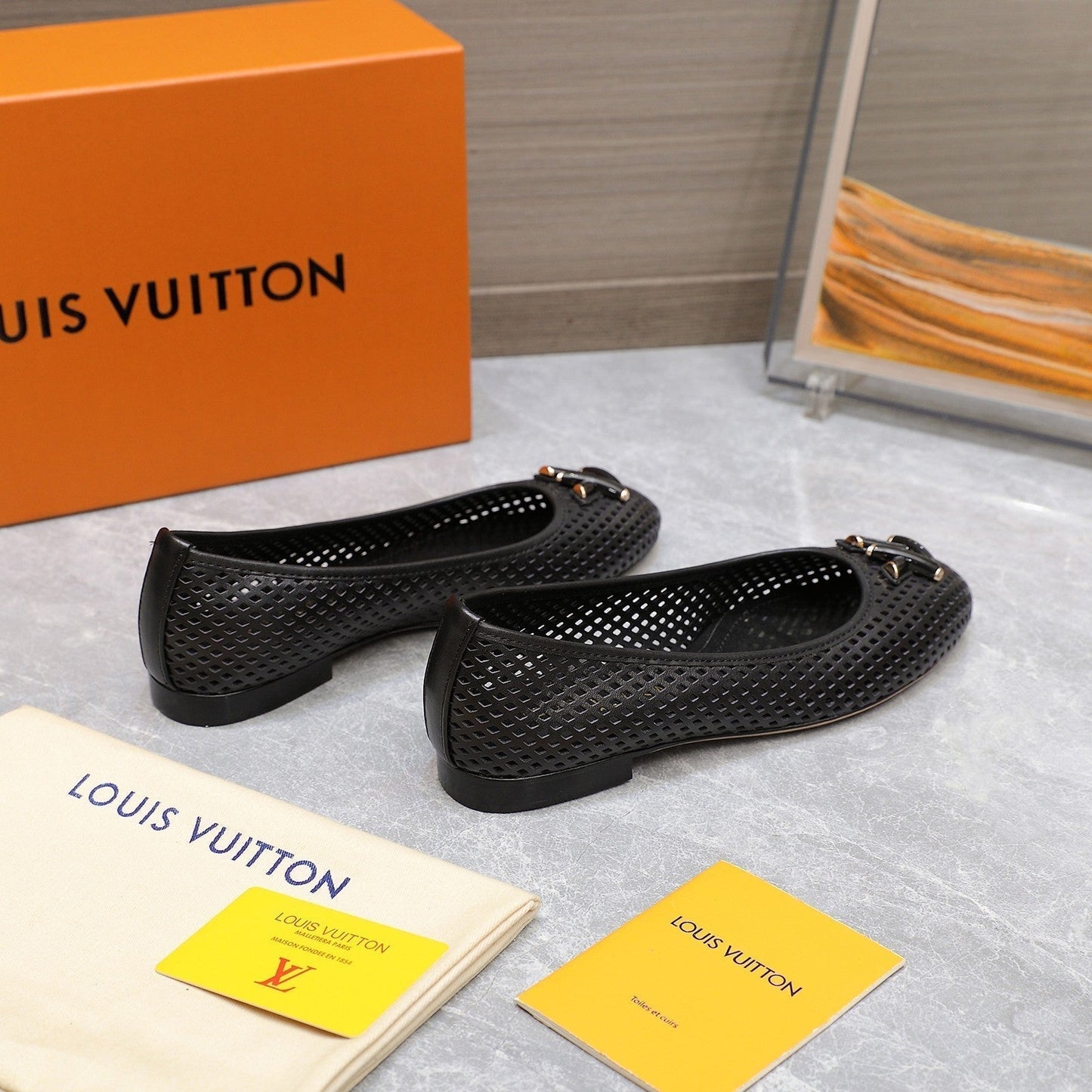 LOUIS VUITTON LV WOMEN'S BALLET FLAT IN BLACK CALFSKIN WITH PERFORATION CRAFTMANSHIP