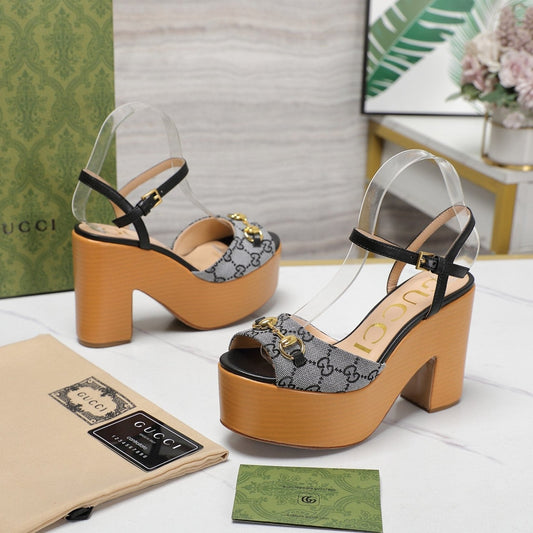 GUCCI HORSEBIT WEDGE SANDAL IN BLACK MONOGRAM JACQUARD FABRIC AND SHEEPSKIN LINING