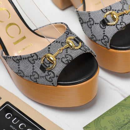 GUCCI HORSEBIT WEDGE SANDAL IN BLACK MONOGRAM JACQUARD FABRIC AND SHEEPSKIN LINING