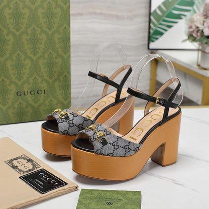 GUCCI HORSEBIT WEDGE SANDAL IN BLACK MONOGRAM JACQUARD FABRIC AND SHEEPSKIN LINING