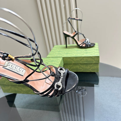 GUCCI CRYSTAL HORSEBIT STRAPPY SANDAL 10.5CM IN BLACK PATENT LEATHER